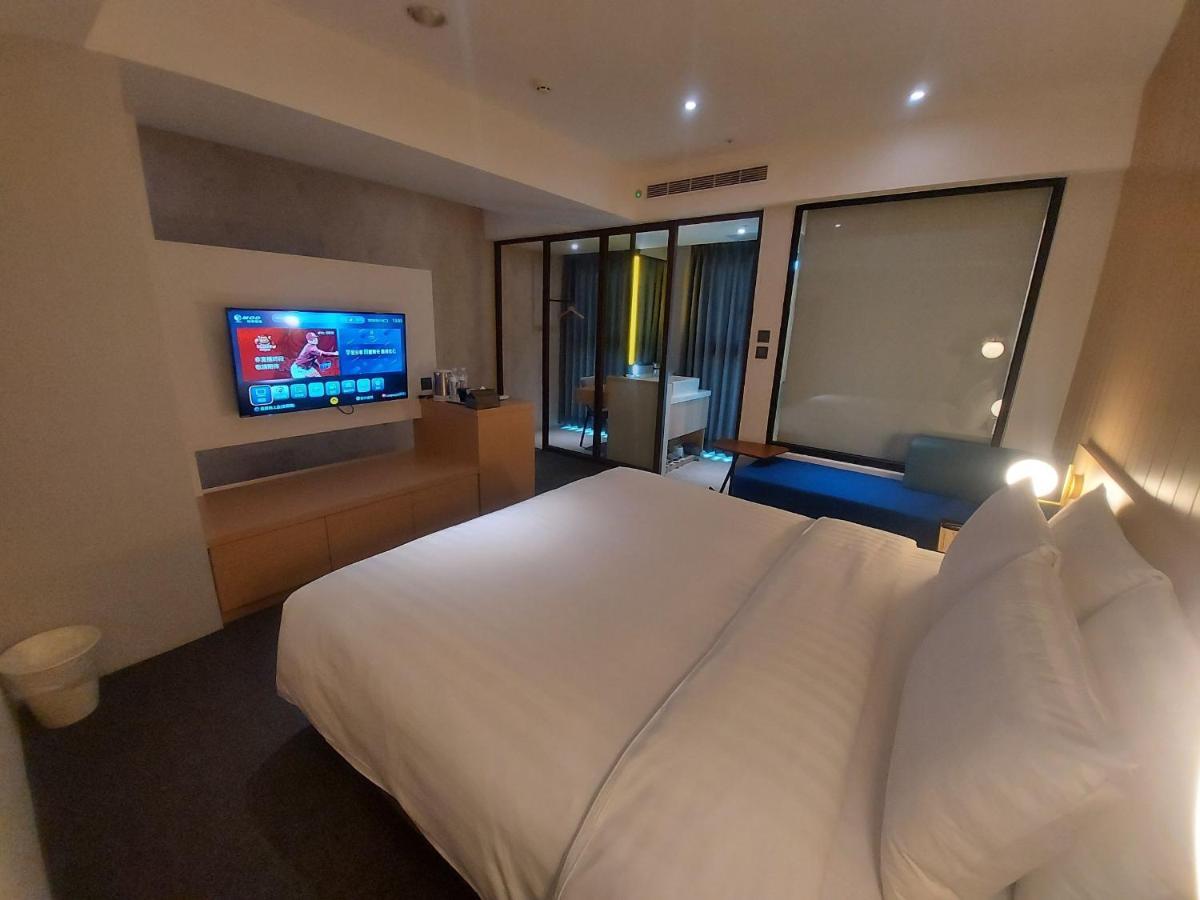 E Hotel Xinshi Экстерьер фото