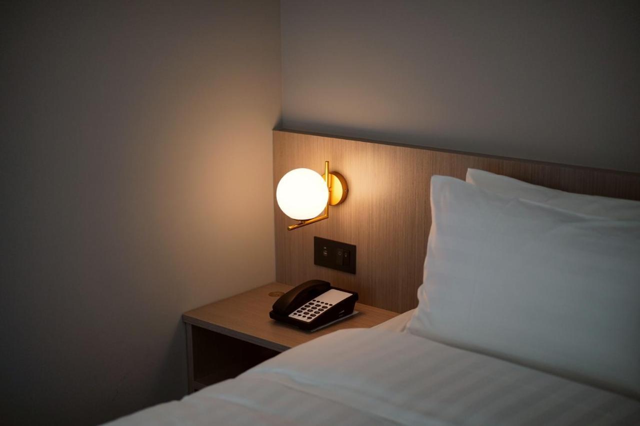 E Hotel Xinshi Экстерьер фото